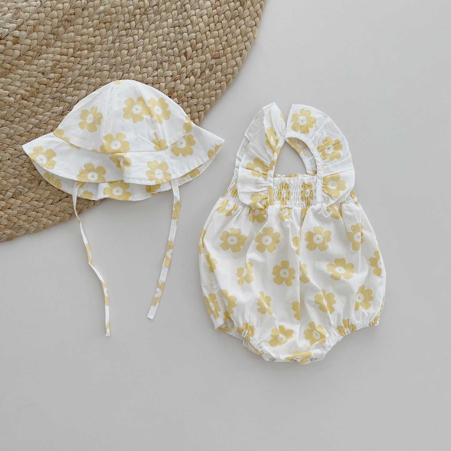 Body mit Blumen und Sonnenhut | 3 - 24 Monate